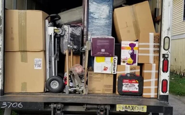 Moving truck packed by Western Light Services